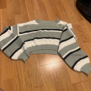 Green white and black striped sweater
